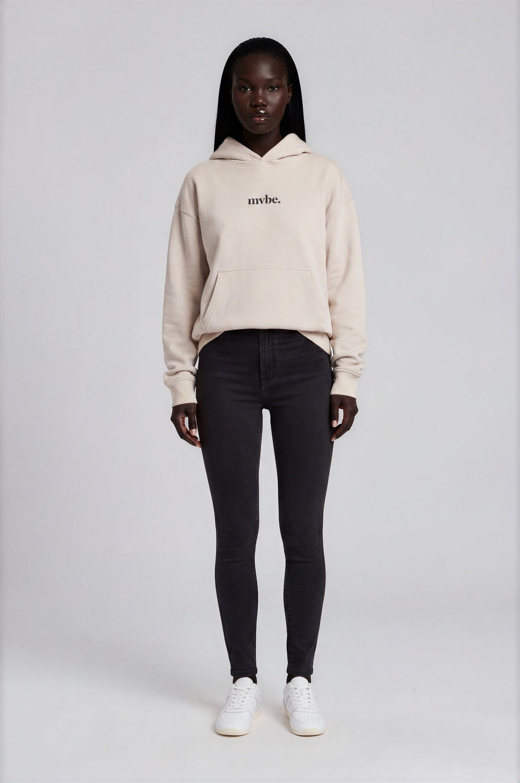 Person wearing a beige hoodie with a logo on the back against a white background
Man wearing a beige oversized hoodie with 'mvbe' logo against a plain background. ribbed sleeves and hem. warm oversized hoodie, these are uni-sex unisex products. The hoodie has aussie, aussie, aussie logo. logo says aussie aussie aussie. australian aussie hoodie